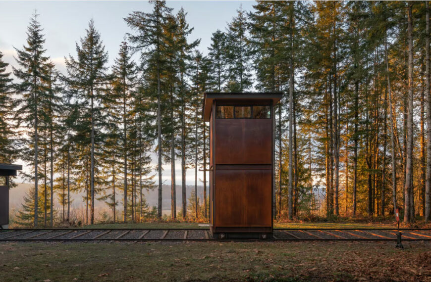 Remarkable home office rolls down a railroad when it’s time for work