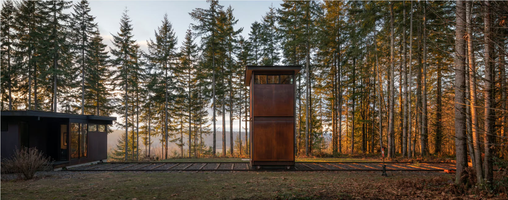 Remarkable home office rolls down a railroad when it’s time for work
